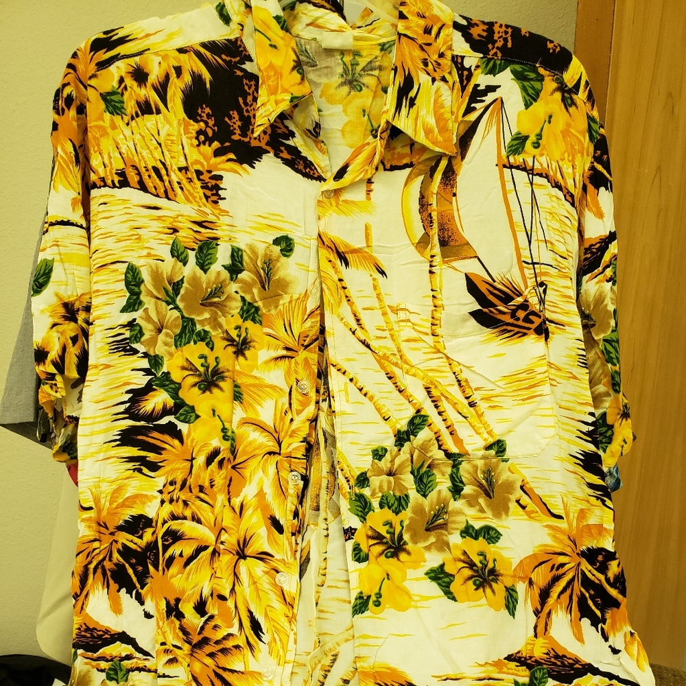 Pretty Men's tropical short sleeve button up shirt in bright yellows and black.